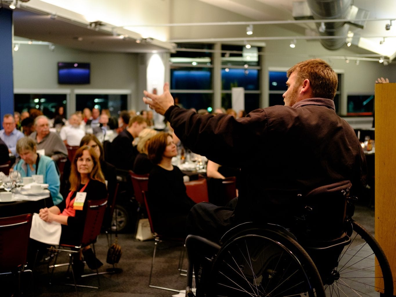 Picture of Barry Long Emceeing event looking out into crowd