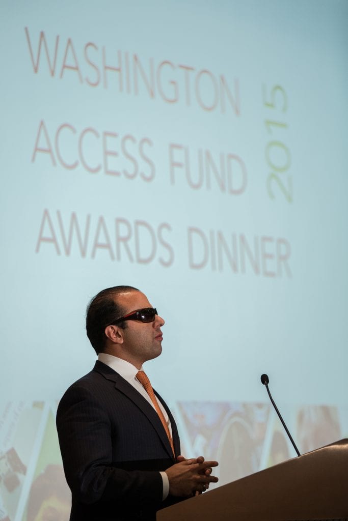 Photo of Cyrus Habib speaking at event