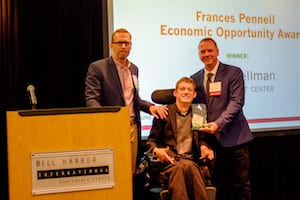 Picture of Michael Richardson and Daman Wandke presenting award to Scott Bellman with DO-IT