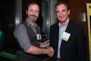 Photo of Jim Kastema with Ivan Owen Innovation award