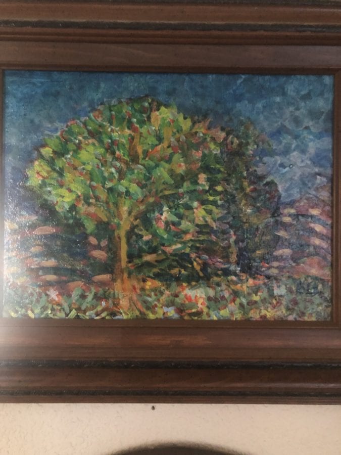 An image of a painting that Beth made, of a green tree.