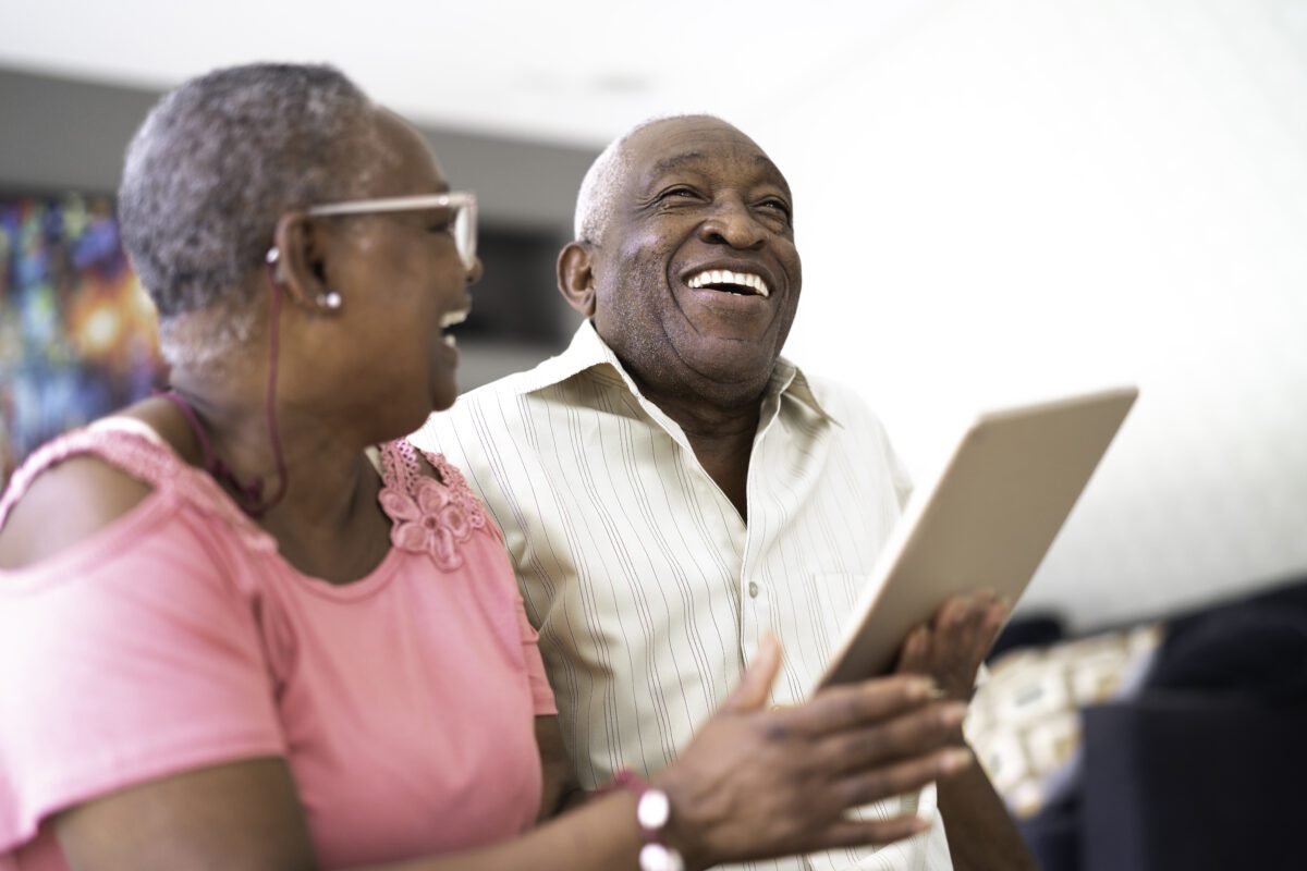 Senior couple using a tablet