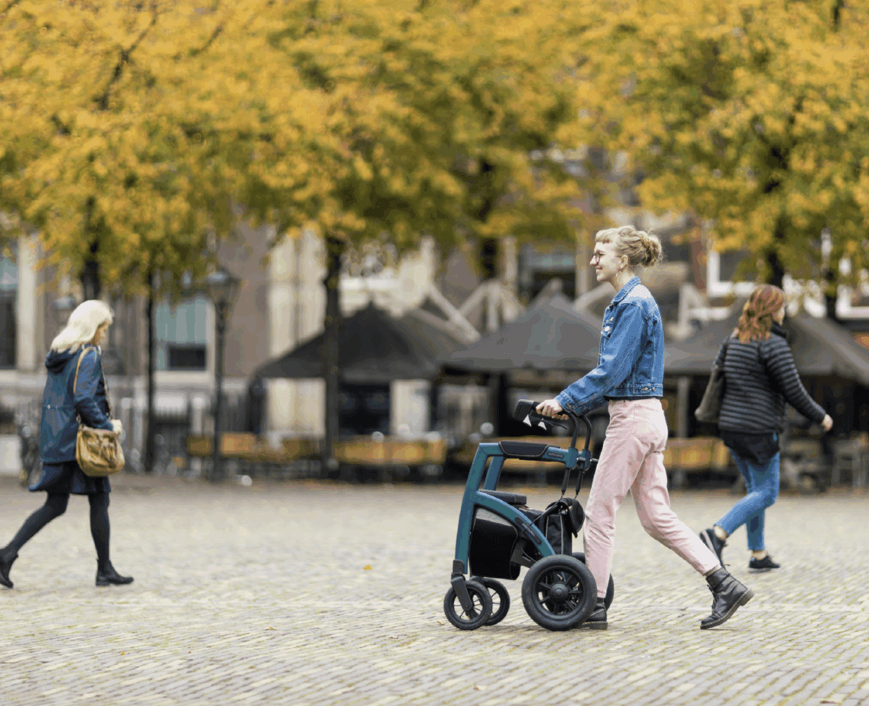 Young woman with a mobility aid outside